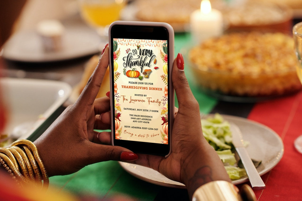 Person holding a phone displaying a Beige Gold Fruitful Sparkle Thanksgiving Dinner Video Invite template for customization in Canva.