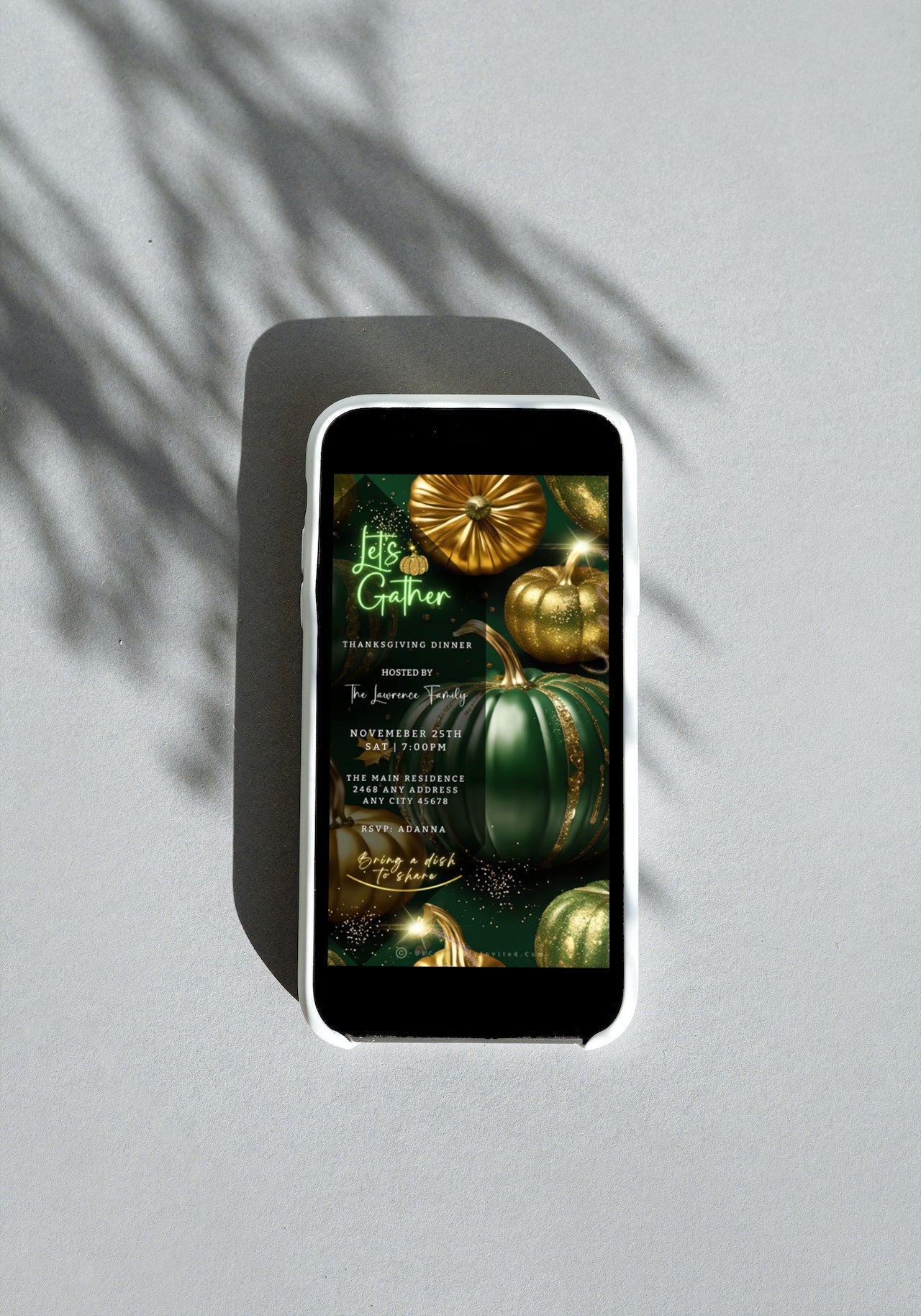 Green Gold Pumpkin Glitter Thanksgiving Dinner Video Invite displayed on a cell phone screen, showcasing customizable digital invitation features.