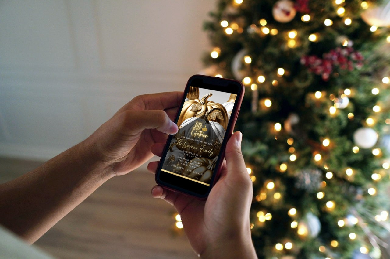 Person holding a phone displaying the Gold Neon White Pumpkin Thanksgiving Dinner Video Invite template for customization on Canva.