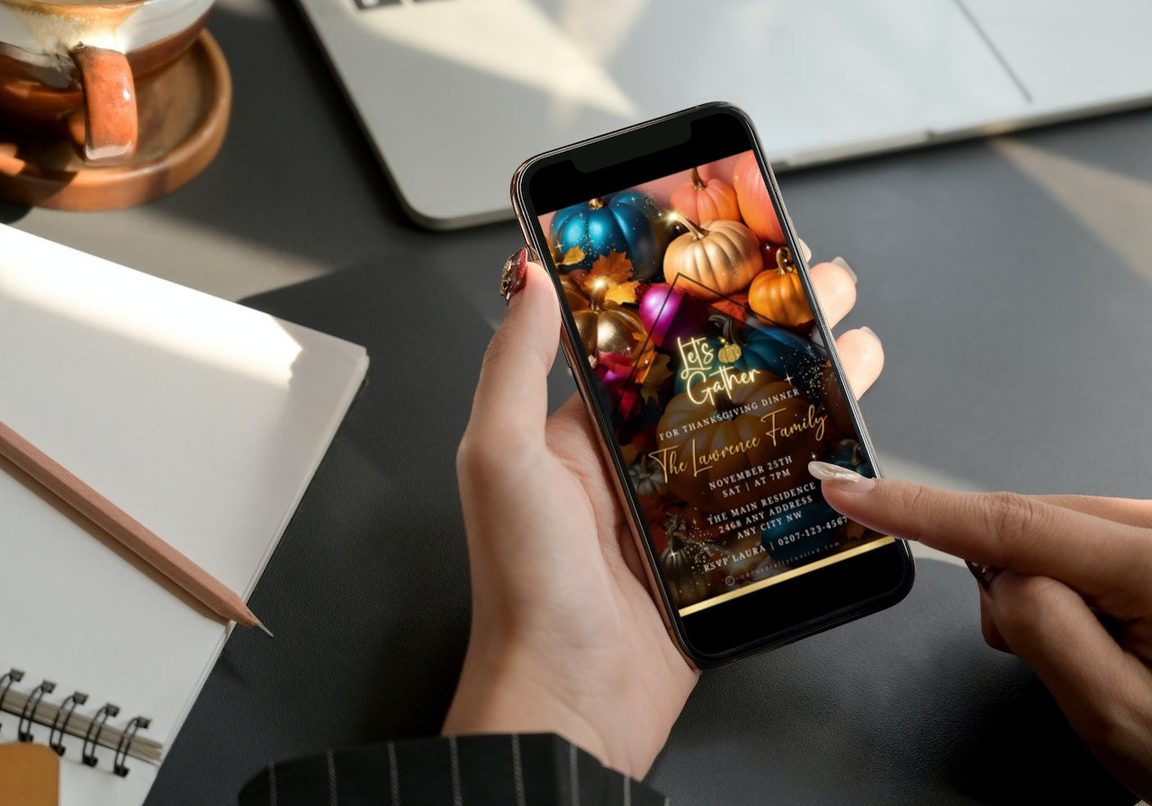 Person holding a phone displaying a Multicoloured Sparkle Pumpkins Thanksgiving Dinner Video Invite template.