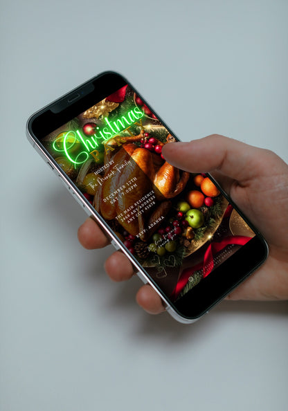 A hand holding a phone displaying a Green Neon Festive Food Platter Christmas Video Invitation template.