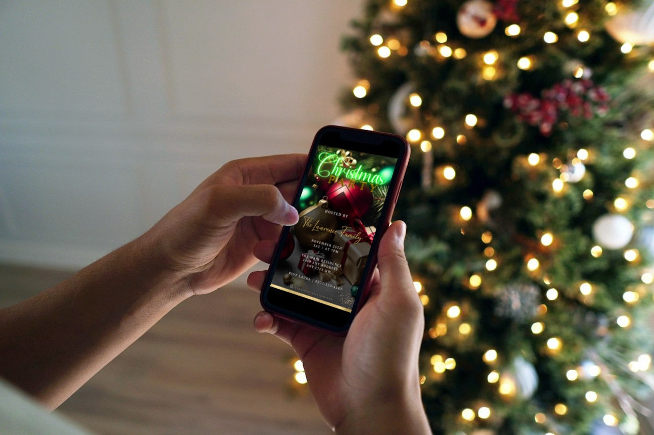 Person holding a phone displaying a Neon Green Presents Ornaments Glitter Christmas Video Invitation template.