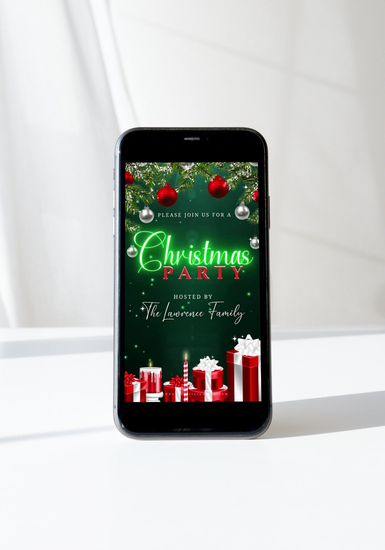 Smartphone displaying a customizable Neon Green Glitter Ornaments Christmas video invitation template with festive elements, available for editing and sharing via Canva.