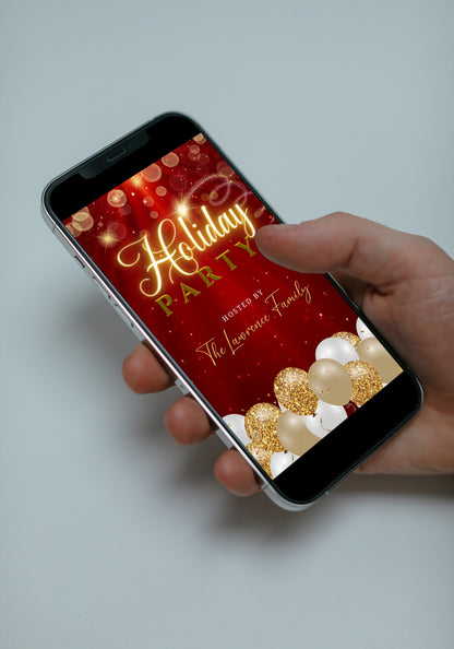 Hand holding a smartphone displaying a customizable Red Gold Glitter Balloons Sparkle Christmas Video Invitation template from URCordiallyInvited. The phone shows festive balloons.