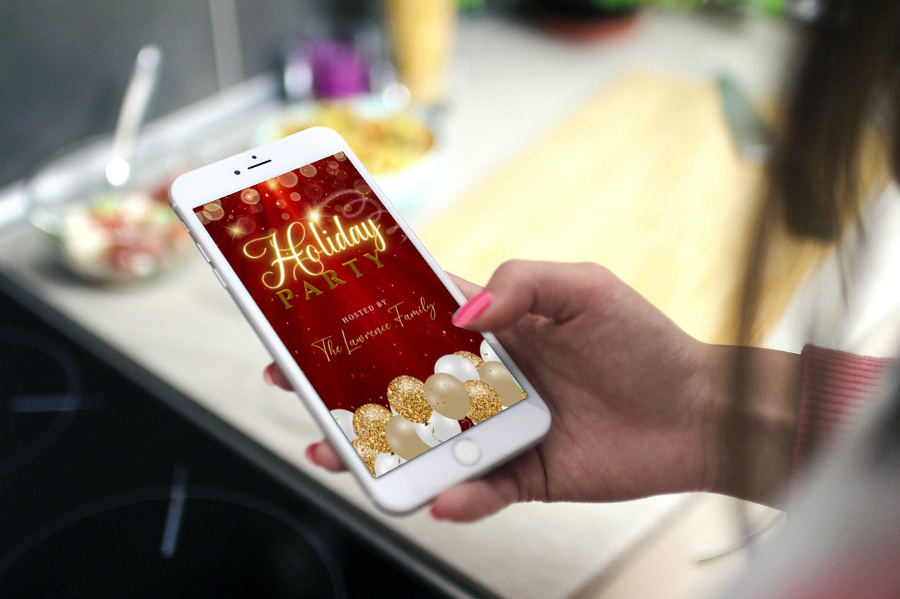 Hand holding a phone displaying a Red Gold Glitter Balloons Sparkle Christmas Video Invitation, a customizable digital template from URCordiallyInvited.