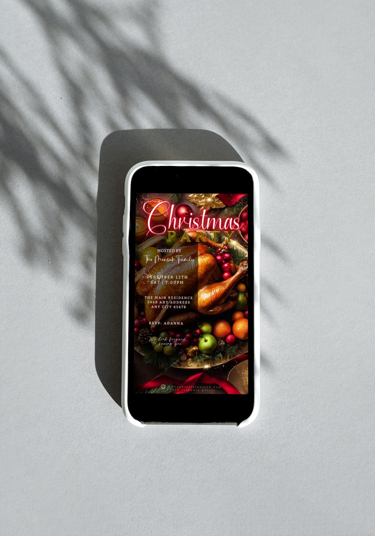 Cell phone displaying a customizable Red Neon Festive Food Platter Christmas Video Invitation template.