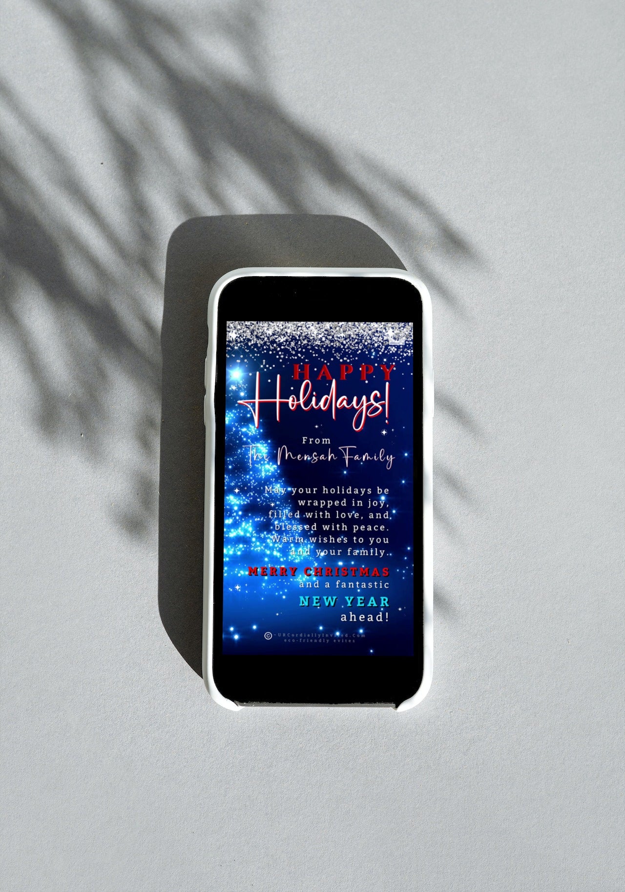 Blue Crystal Silver | Happy Holidays Video Greeting Ecard displayed on a smartphone screen, showcasing editable text and customizable elements for digital invitations via Canva.