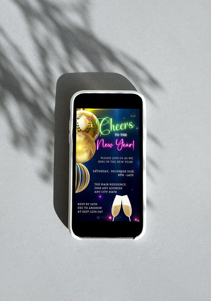 Smartphone displaying an editable digital New Year's Eve party video invitation template with ornamental colorful champagne design.
