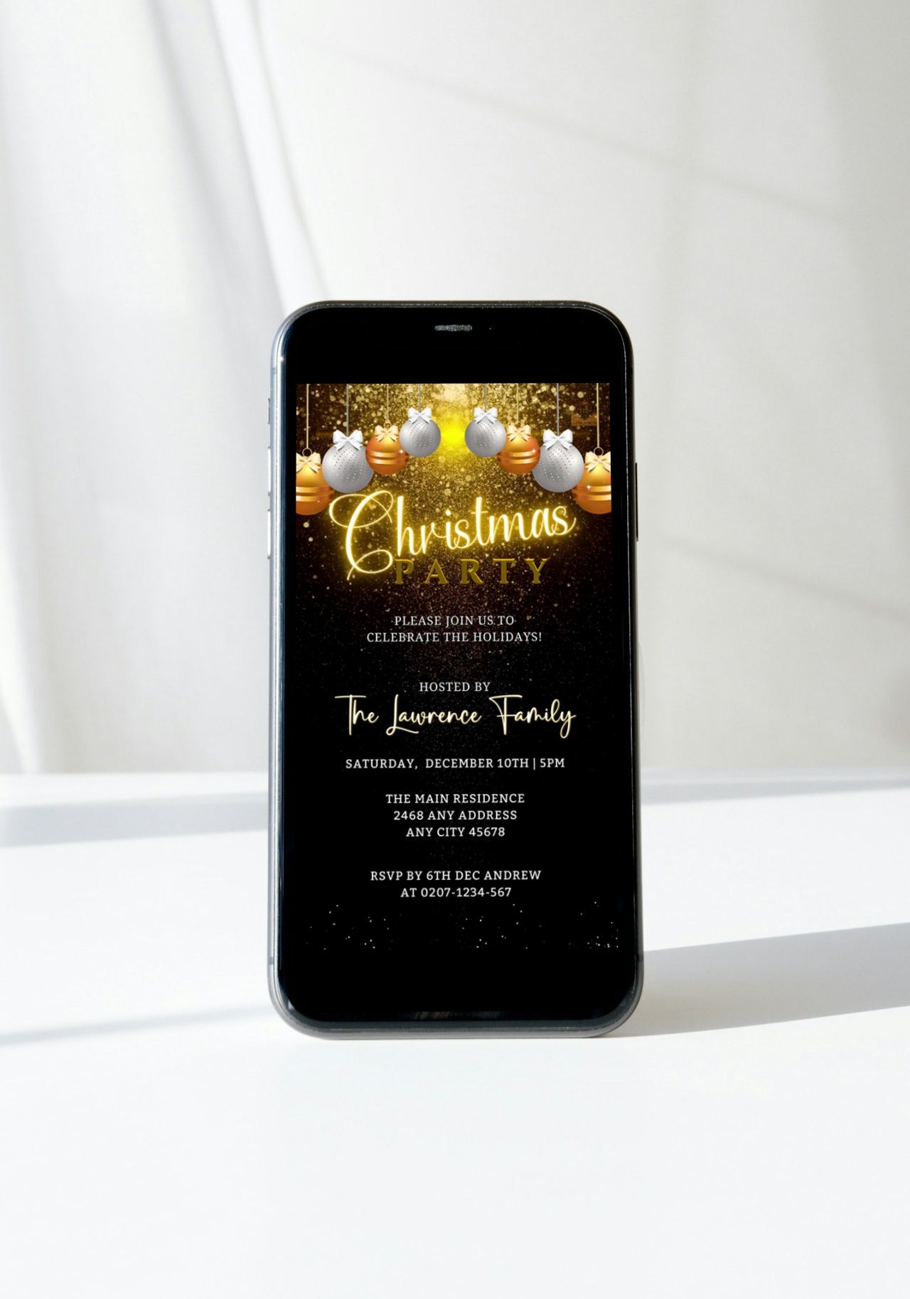 Digital phone screen displaying Snowy Gold White Ornaments Glitter | Christmas Party Video Invite customizable template, featuring gold and silver ornaments. Editable via Canva for eco-friendly digital invitations.