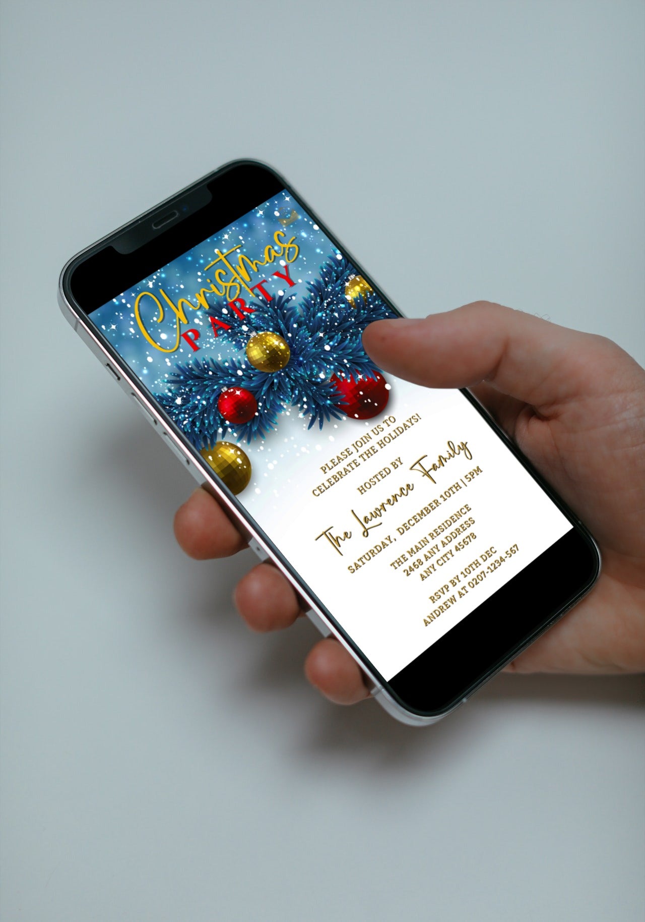 Hand holding a smartphone displaying the Snowy Elegance Blue Leaves Christmas Party Video Invite, customizable via Canva for easy event personalization and electronic sharing.