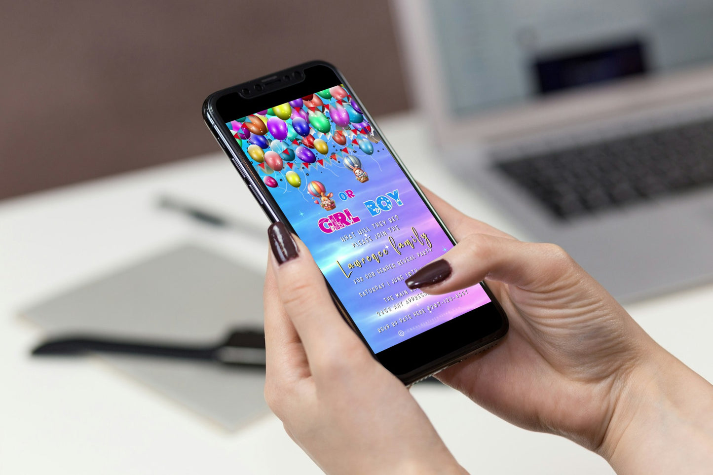 Hand holding a smartphone displaying the customizable Easter Bunnies In Hot Air Balloons digital gender reveal video invite template.