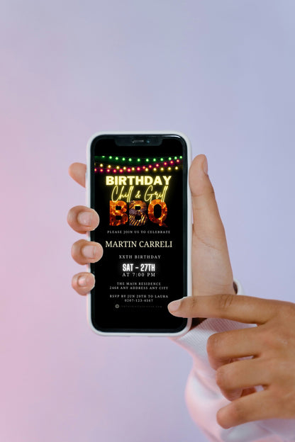 Hand holding a smartphone displaying the customizable BBQ Flaming Grill Birthday Digital Video Party Invite, editable via Canva and shareable through various messaging apps.