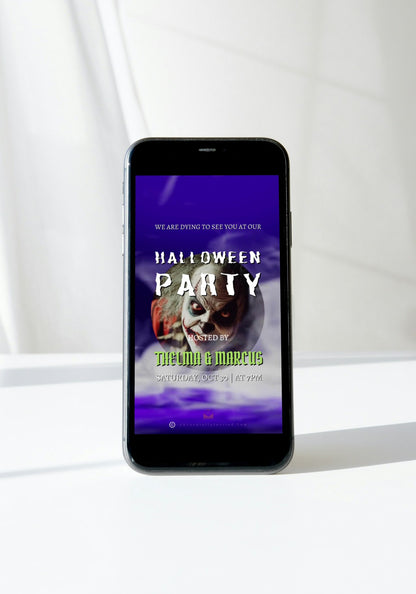 Smartphone displaying the Misty Purple Smoke Pumpkin Halloween Party Video Invite, featuring an animated pumpkin surrounded by swirling purple smoke on the screen.