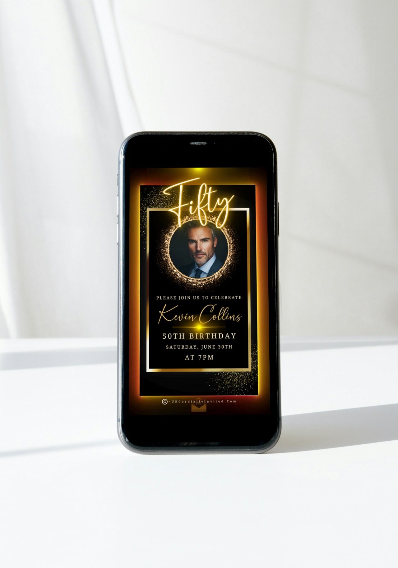 50th Birthday Video Invitation featuring a man in a suit and tie, displayed on a smartphone screen, with an elegant gold oval photo frame.