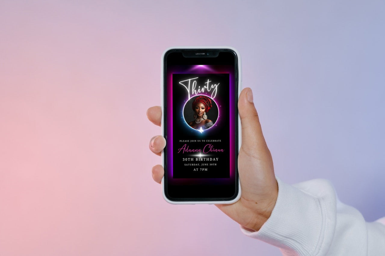 Hand holding smartphone displaying a woman's photo, associated with the 30th Birthday Video Invitation featuring a pink and purple oval photo frame from URCordiallyInvited.