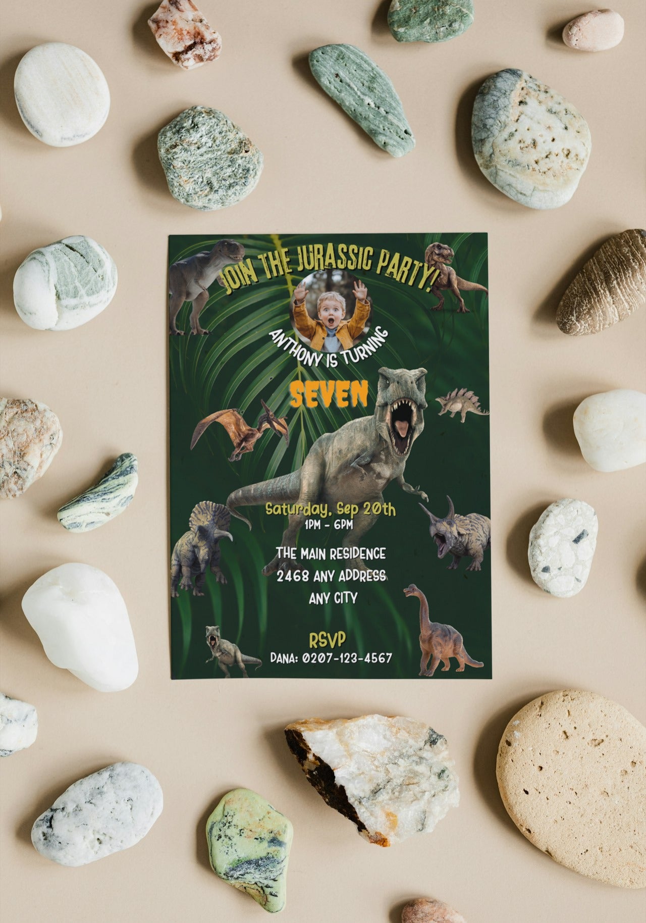 Dinosaur Birthday Video Invitation featuring dinosaurs and rocks for a Jurassic-themed party, customizable with child's name and age. Ideal for dino enthusiasts.