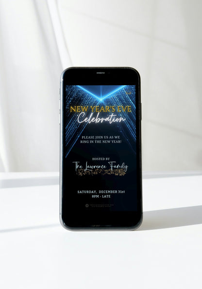 Dazzling Blue Gold New Year’s Eve Celebration Video Invitation displayed on a mobile phone screen, featuring festive text and customizable party details for electronic sharing.